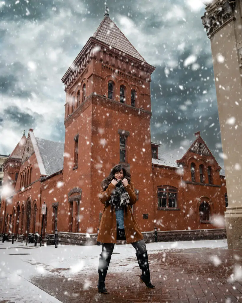 Christine in the snow in Lancaster outside the central market